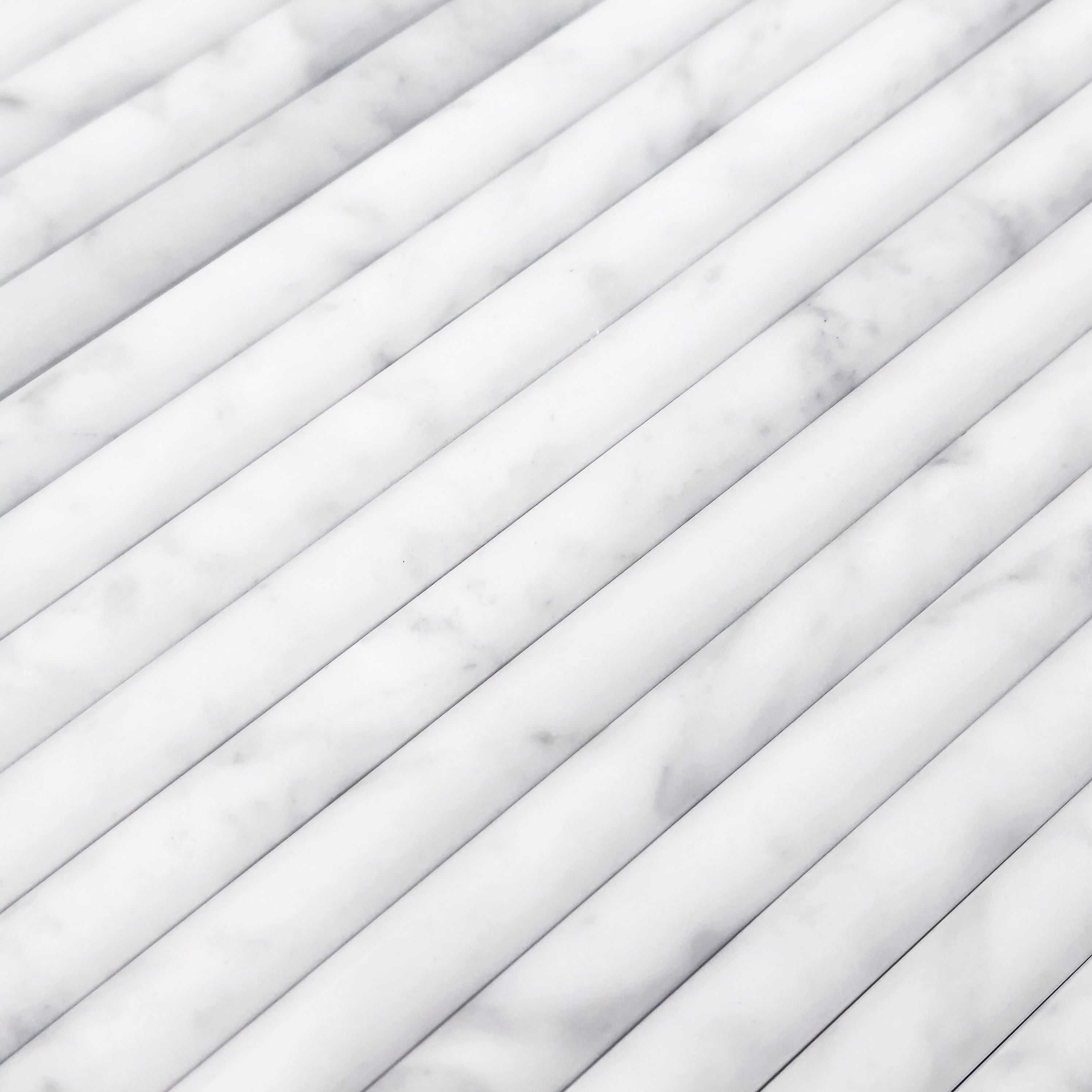 Elon Tile Petite Pencil tile arrangement — available at Surface Group