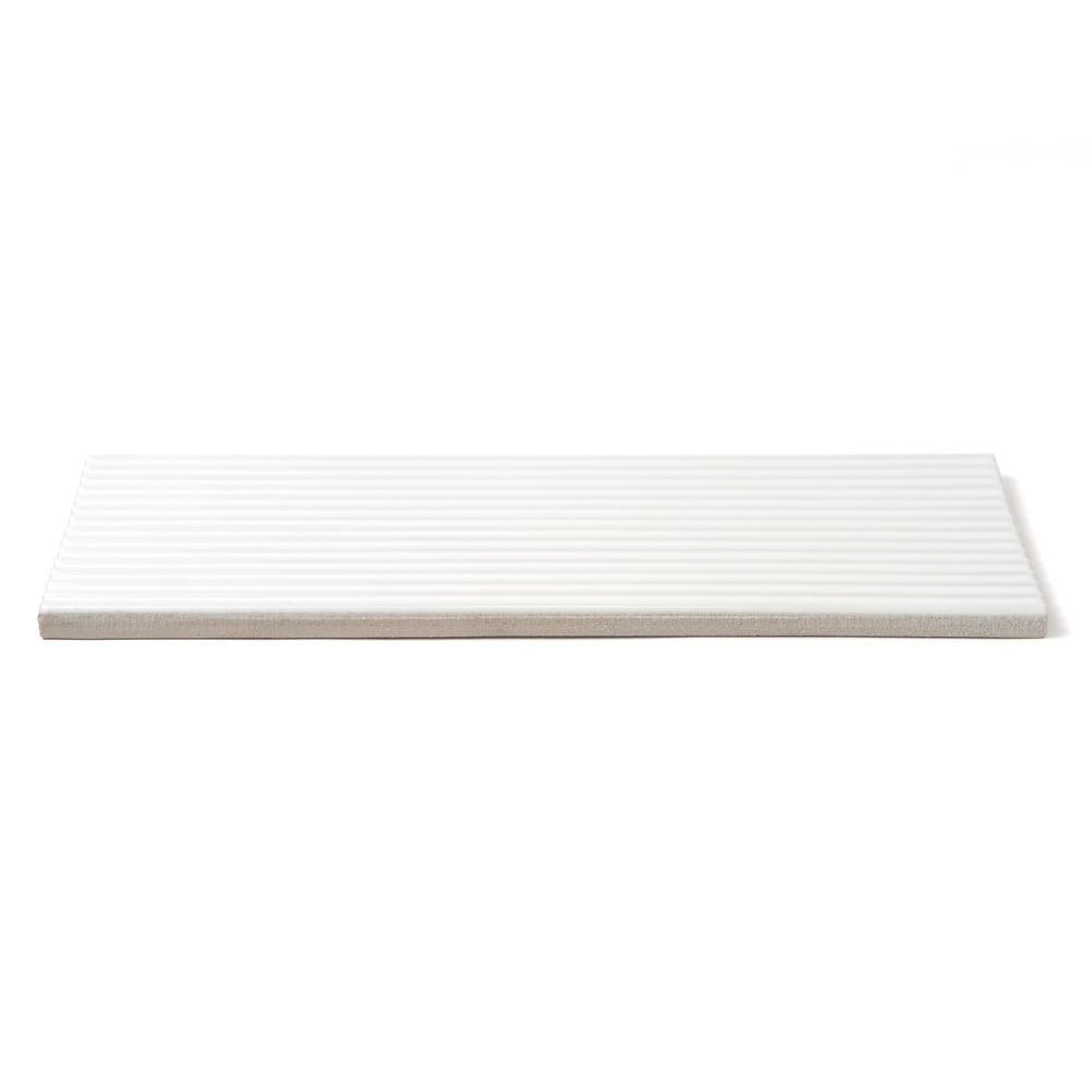 Closeout Sale Royal White ceramic field tile, top-down product view, 4"Γ12"Γ1/2" size. Premium ceramic for floors and walls.