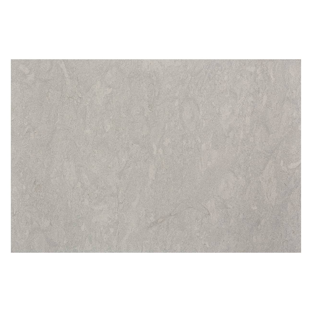 Bateig Blue limestone field tile with brushed finish and worn edge, ideal for residential flooring.