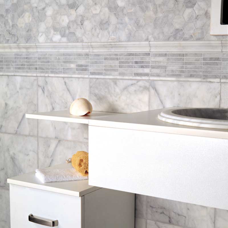 Avenza Honed Hexagon Marble Mosaic 10 3/8×12 (MS00482) Avenza Honed Pencil Liner Marble Moldings 1/2×12 (ML00415) Avenza Honed Andorra Marble Moldings 2×12 (ML00416) Avenza Honed Marble Tile 12×12 (TL12765)