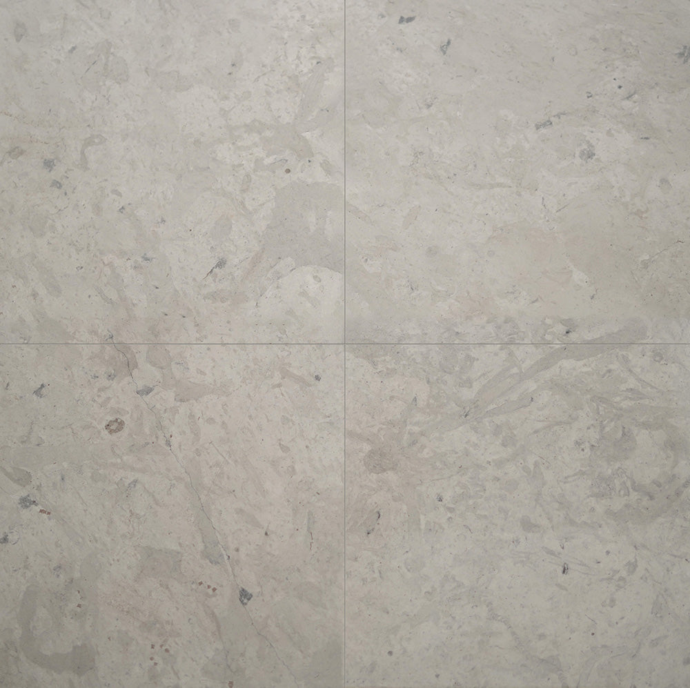 Marble Systems Britannia Limestone Tile Britannia Light matte limestone tile pattern swatch — available at Surface Group