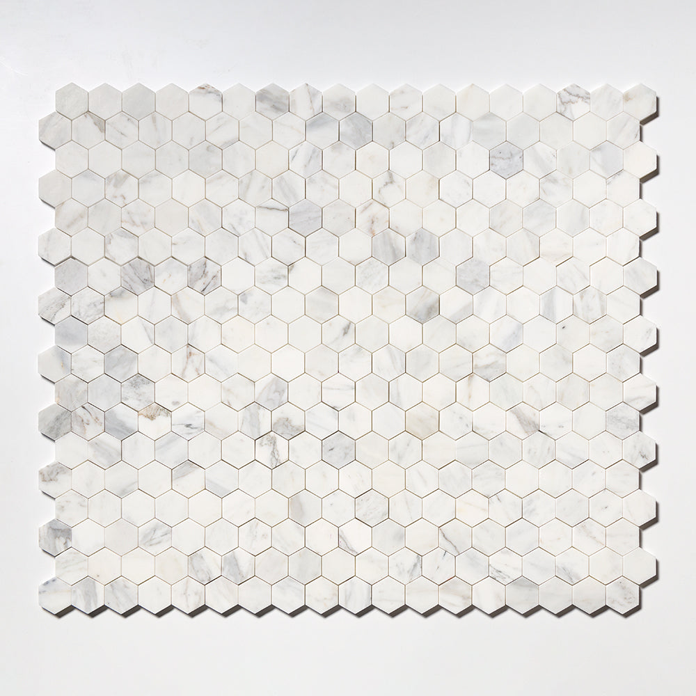 Marble Systems Calacatta Gold Royal Honed Marble Calacatta Gold Royal matte tile pattern swatch — available at Surface Group