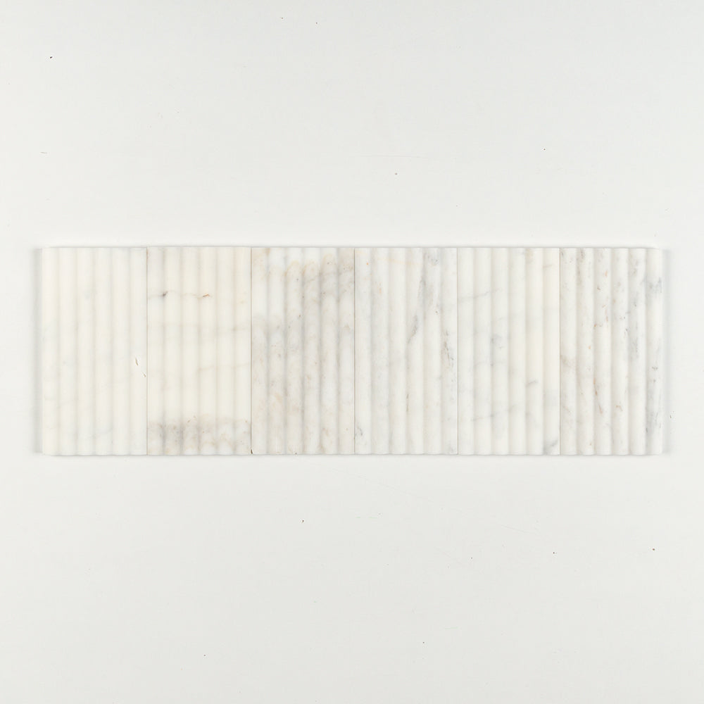 Marble Systems Calacatta Gold Royal Honed Marble Calacatta Gold Royal matte tile pattern swatch — available at Surface Group
