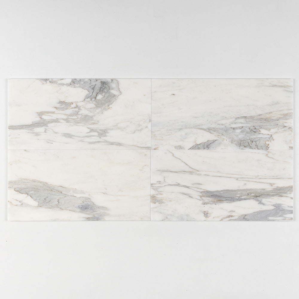 Marble Systems Calacatta Gold Royal Polished Marble Calacatta Gold Royal glossy tile pattern swatch — available at Surface
