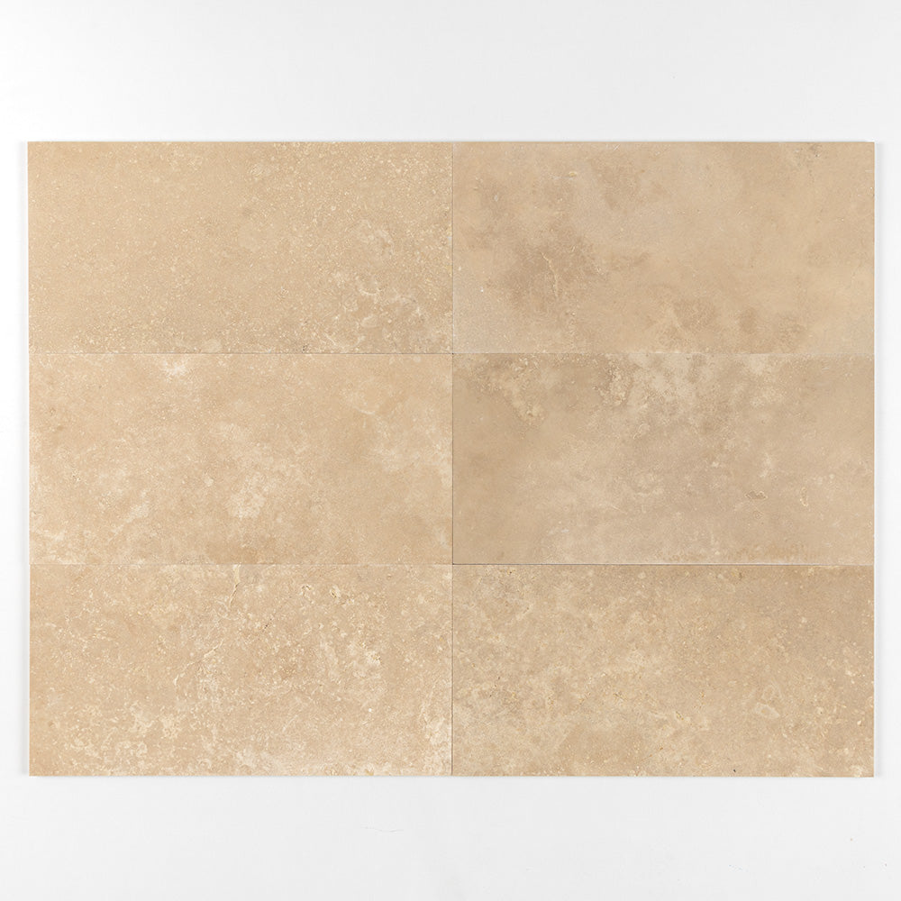 Marble Systems Ivory Travertine Ivory matte travertine tile pattern swatch — available at Surface Group