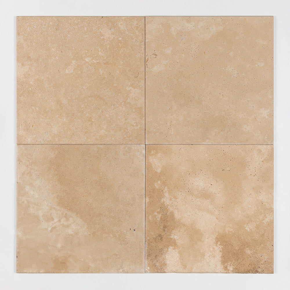 Marble Systems Ivory Travertine Ivory rugged travertine tile pattern swatch β available at Surface Group