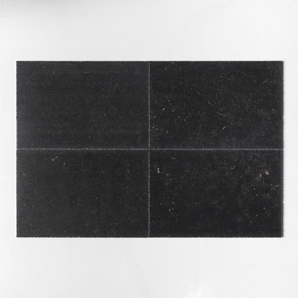 Marble Systems La Roche Limestone Belgium Blue textured limestone tile pattern swatch — available at Surface Group