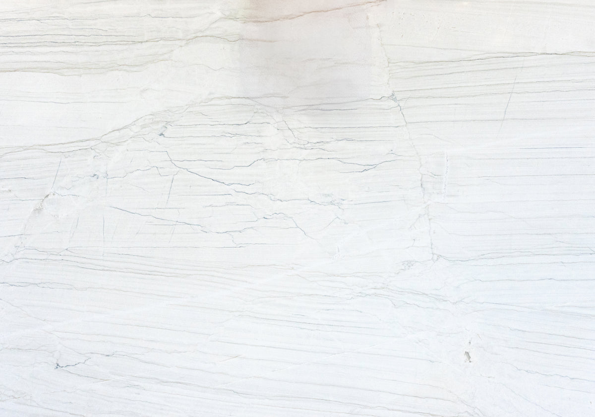 Marble Systems Quartzite Slabs Calacatta Lux textured quartzite tile — available at Surface Group