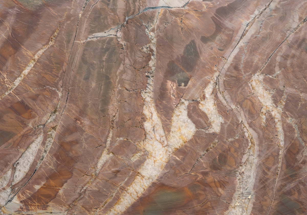 Marble Systems Quartzite Slabs Explosion Rouge Leather rugged quartzite tile — available at Surface Group