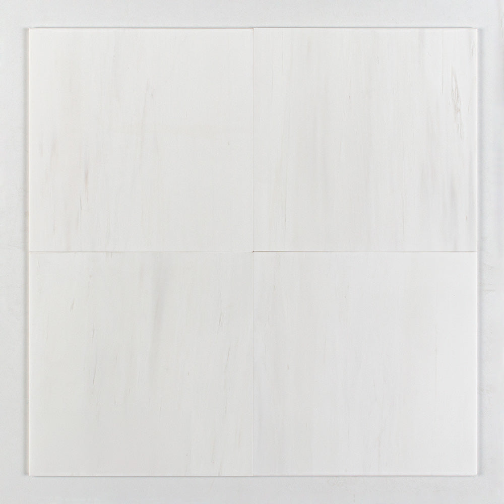Marble Systems Snow White Honed Marble (Premium Bianco Dolomiti) Snow White matte tile pattern swatch β available at Surface