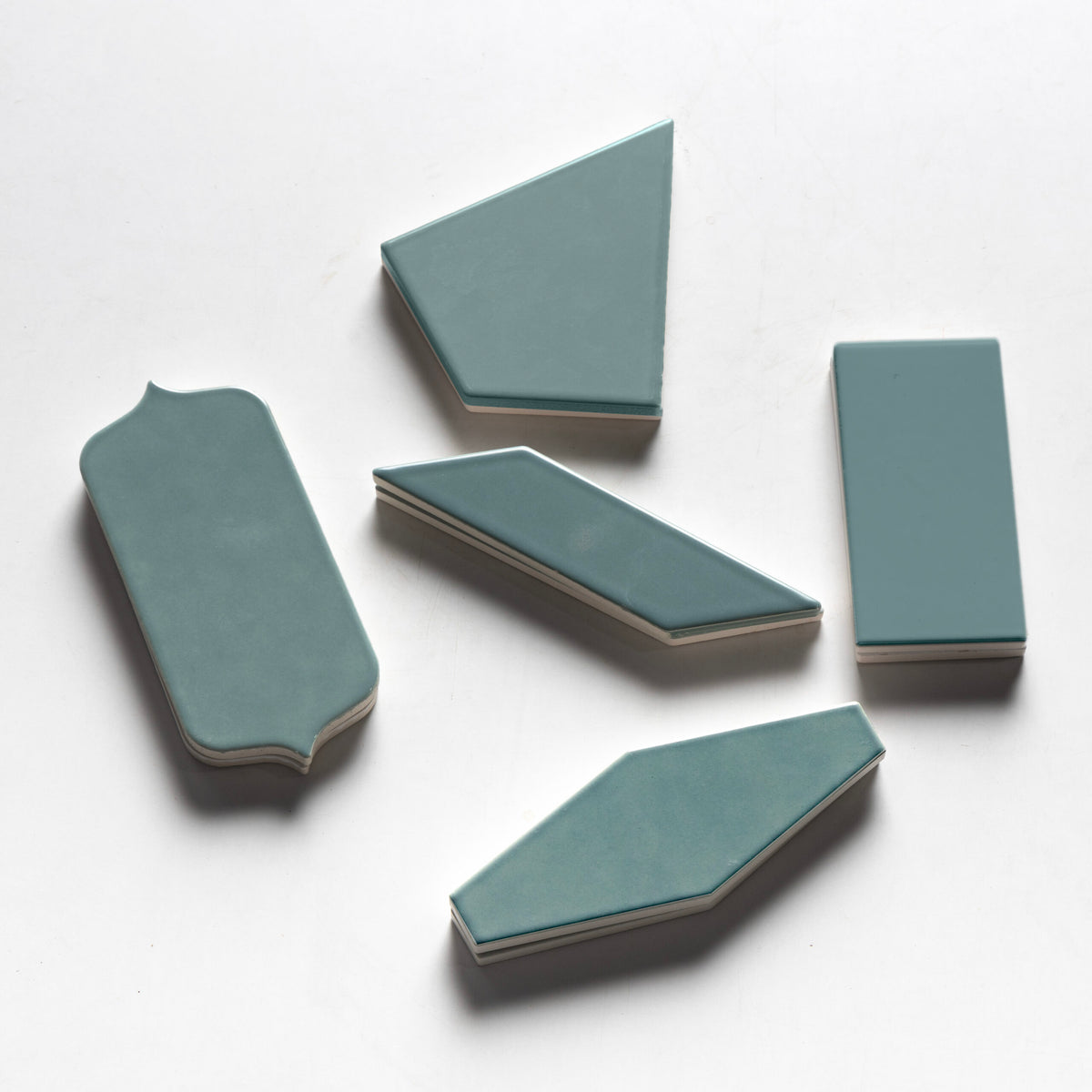 Marble Systems Status Ceramic Witty Green glossy ceramic tile pattern design — available at Surface Group