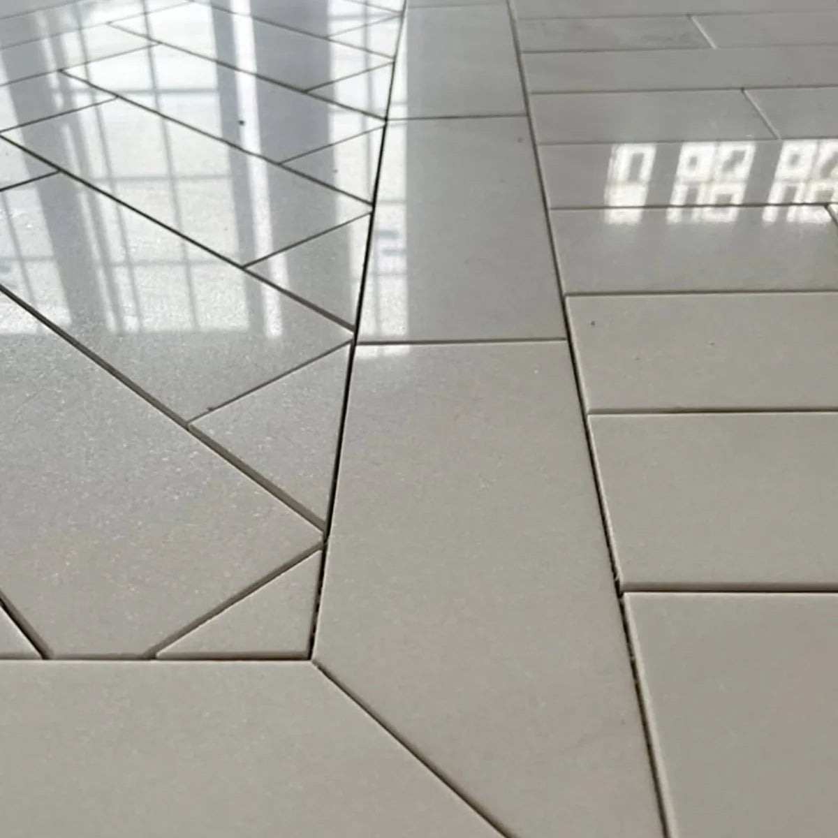 Thassos White Polished Marble White field tile, lifestyle installation view. Premium marble for floors and walls.