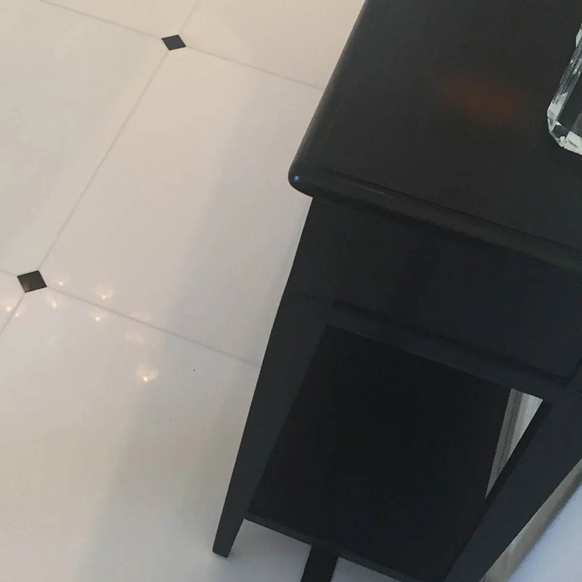 Essentials Natural Stone White field tile, lifestyle installation view. Premium marble for floors and walls.