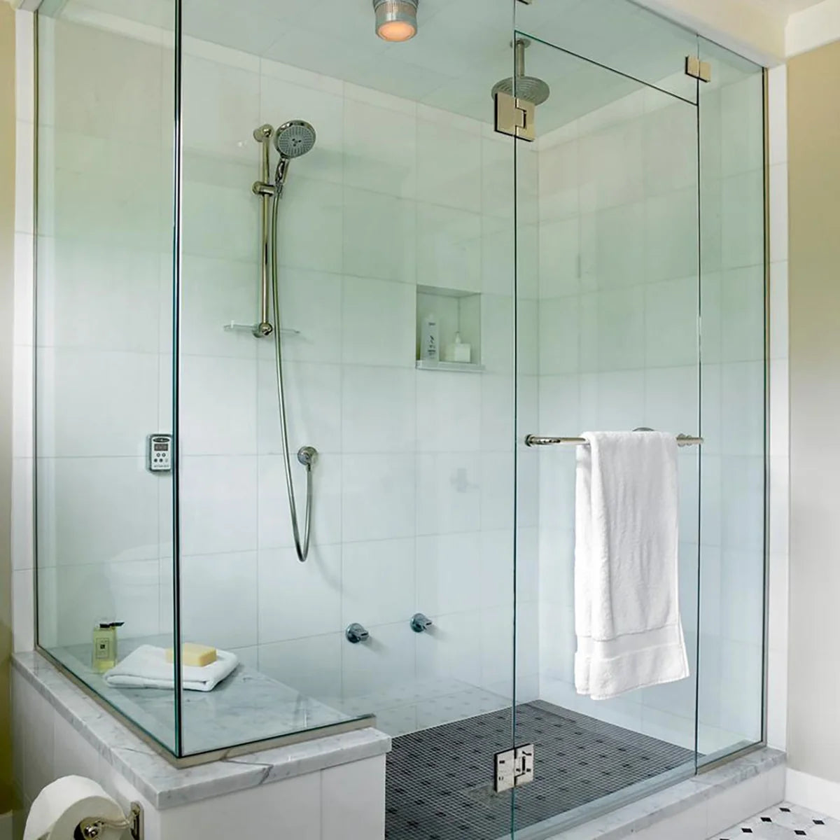 Essentials Natural Stone White field tile, lifestyle installation view 1. Premium marble for floors and walls.