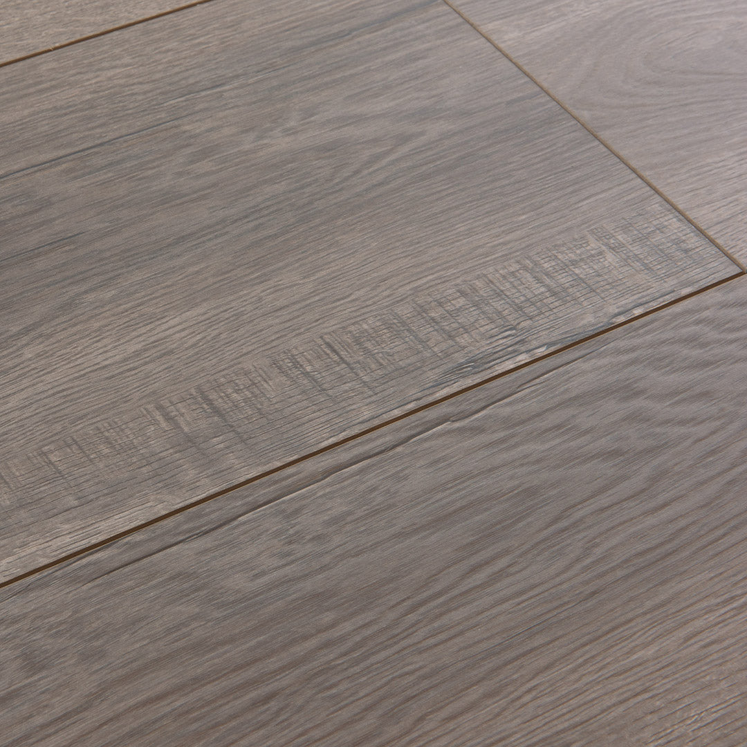 surface group artisan napa valey glacier gray laminate flooring plank angled.jpg