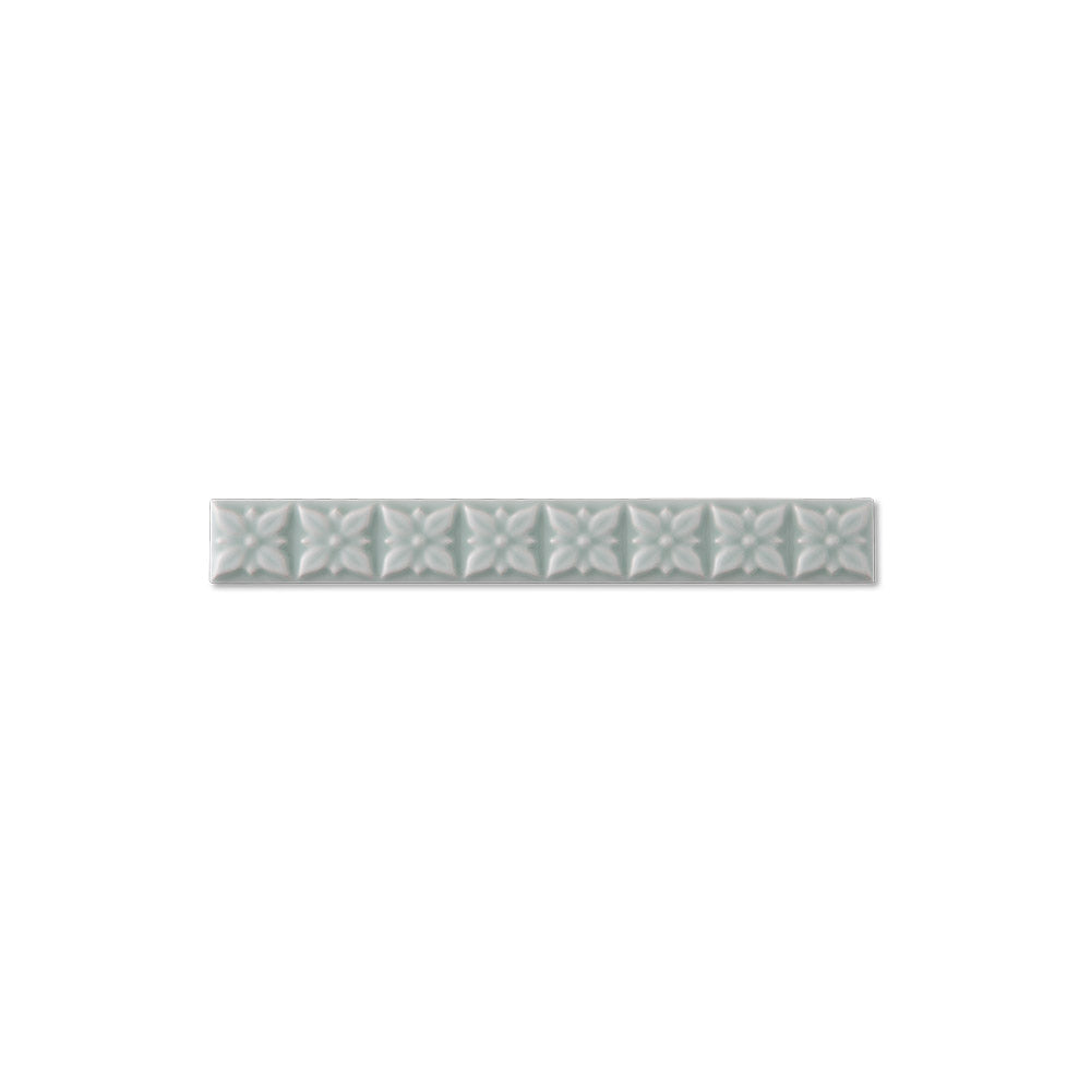 adex ceramic tile for indoor wall and or floor studio fern molding deco liner deco glossy translucent mono embossed deco 1x7_8 embossed ponciana distributed by surface group international