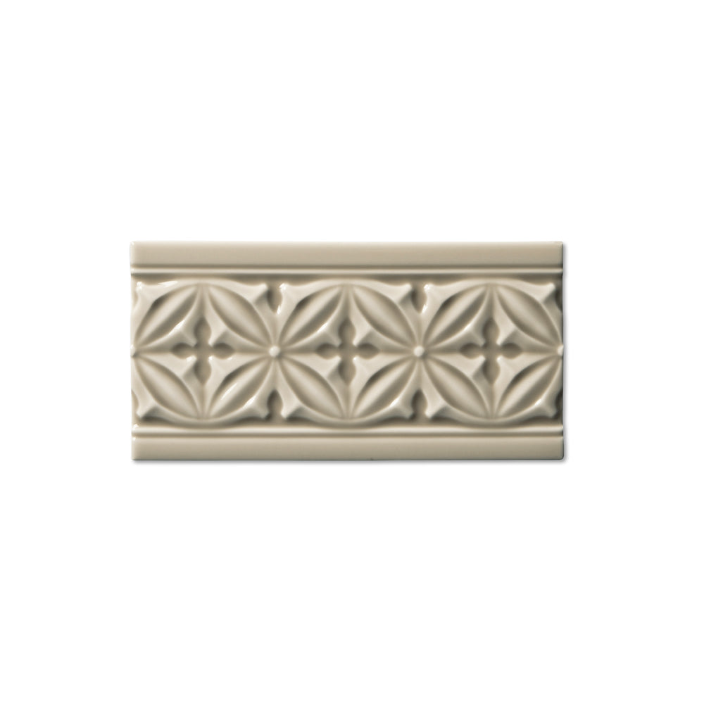 adex ceramic tile for indoor wall and or floor studio silver sands molding deco border glossy translucent mono embossed deco 3_8x7_8 embossed gables distributed by surface group international