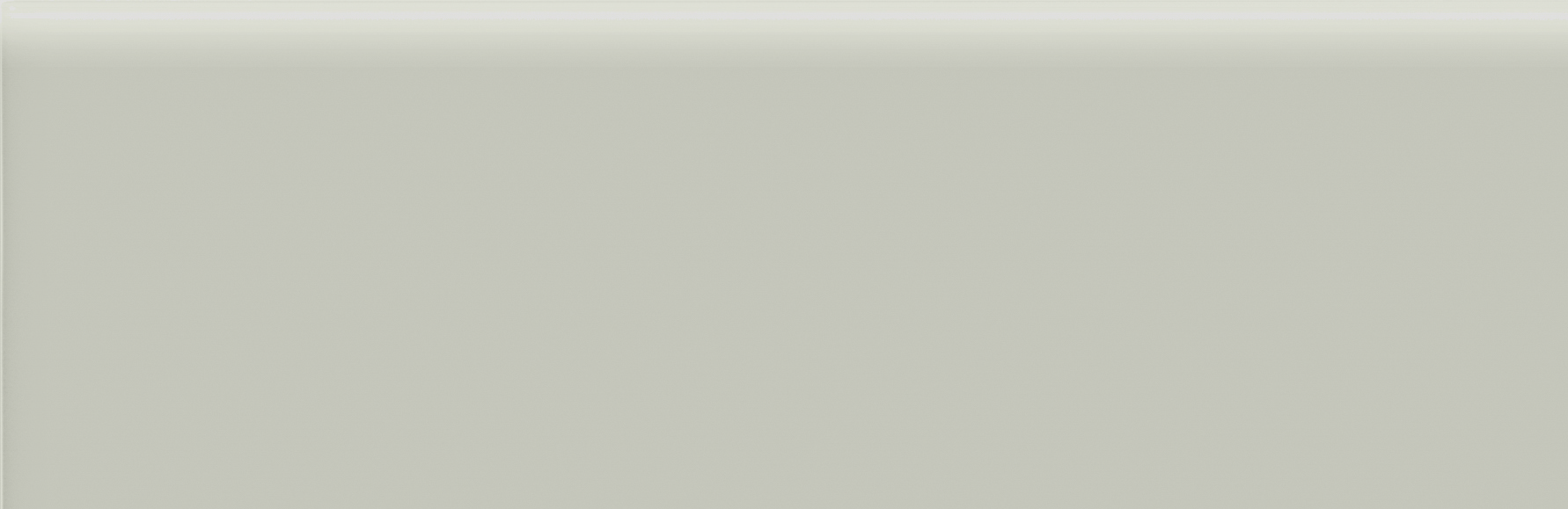 soft sage pattern glazed ceramic bullnose molding from soho anatolia collection distributed by surface group international glossy finish pressed edge 2x6 bar shape