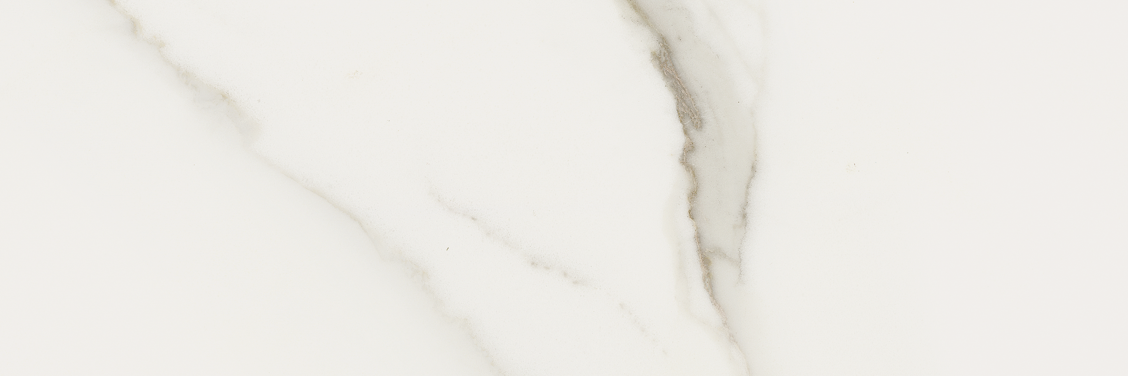 calacatta oro pattern glazed porcelain field tile from mayfair anatolia collection distributed by surface group international polished finish rectified edge 4x12 rectangle shape