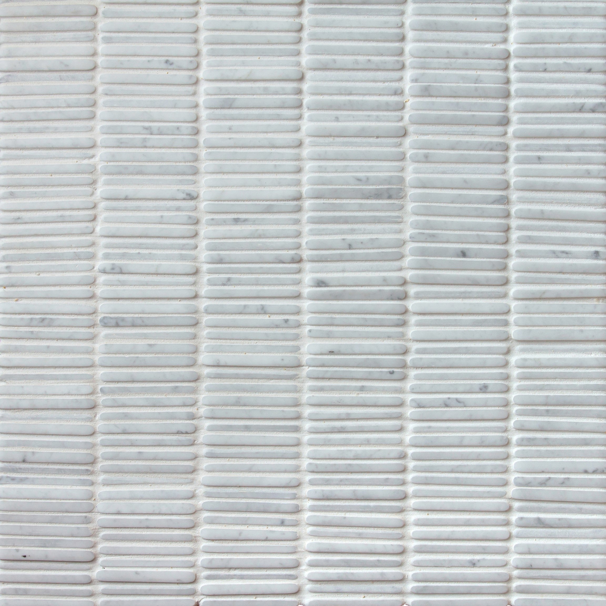 giovanni barbieri timeworn carrara natural white marble straight stack pattern mosaic 1x4 distributed by surface group international