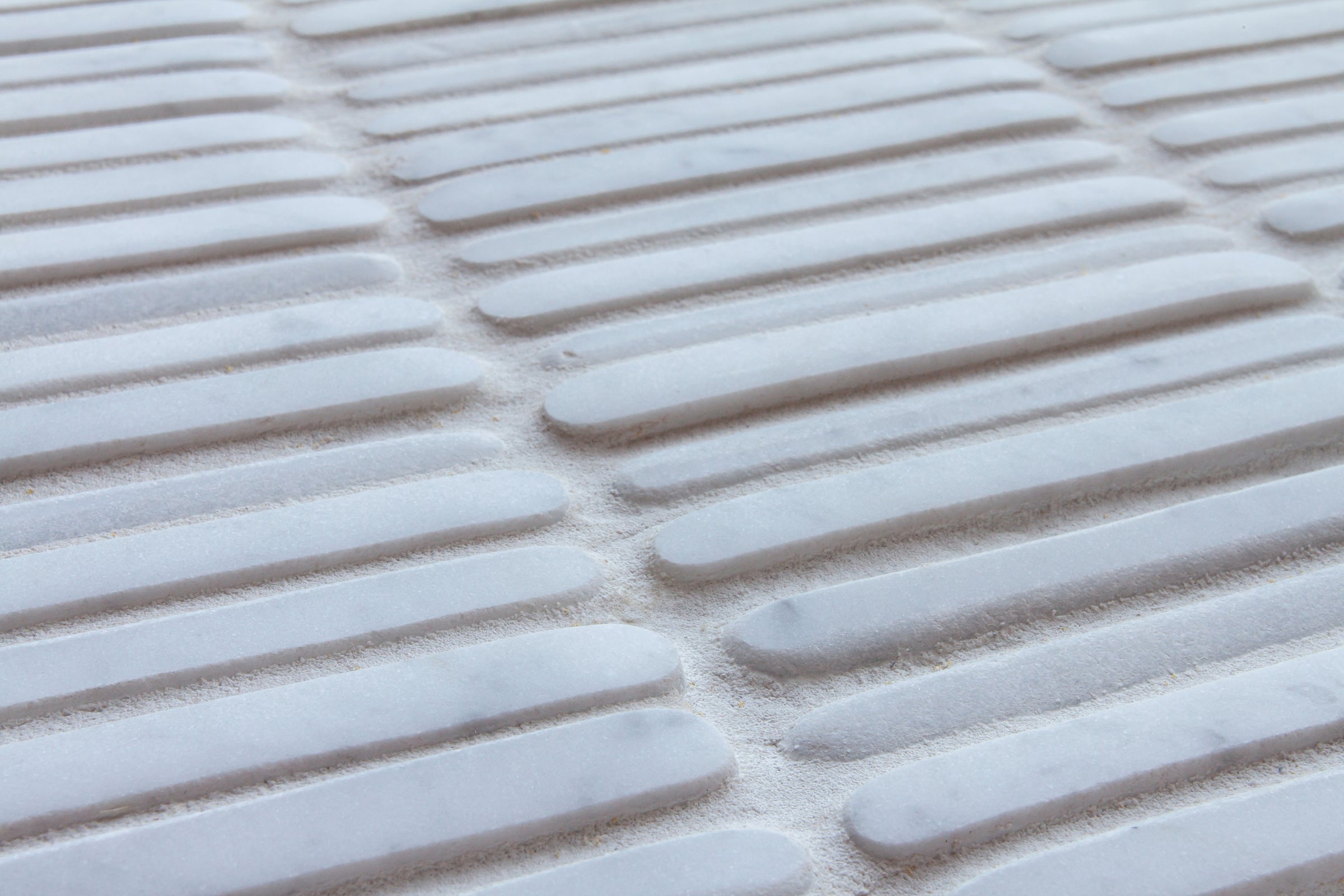 giovanni barbieri timeworn carrara natural white marble straight stack pattern mosaic 1x4 distributed by surface group international