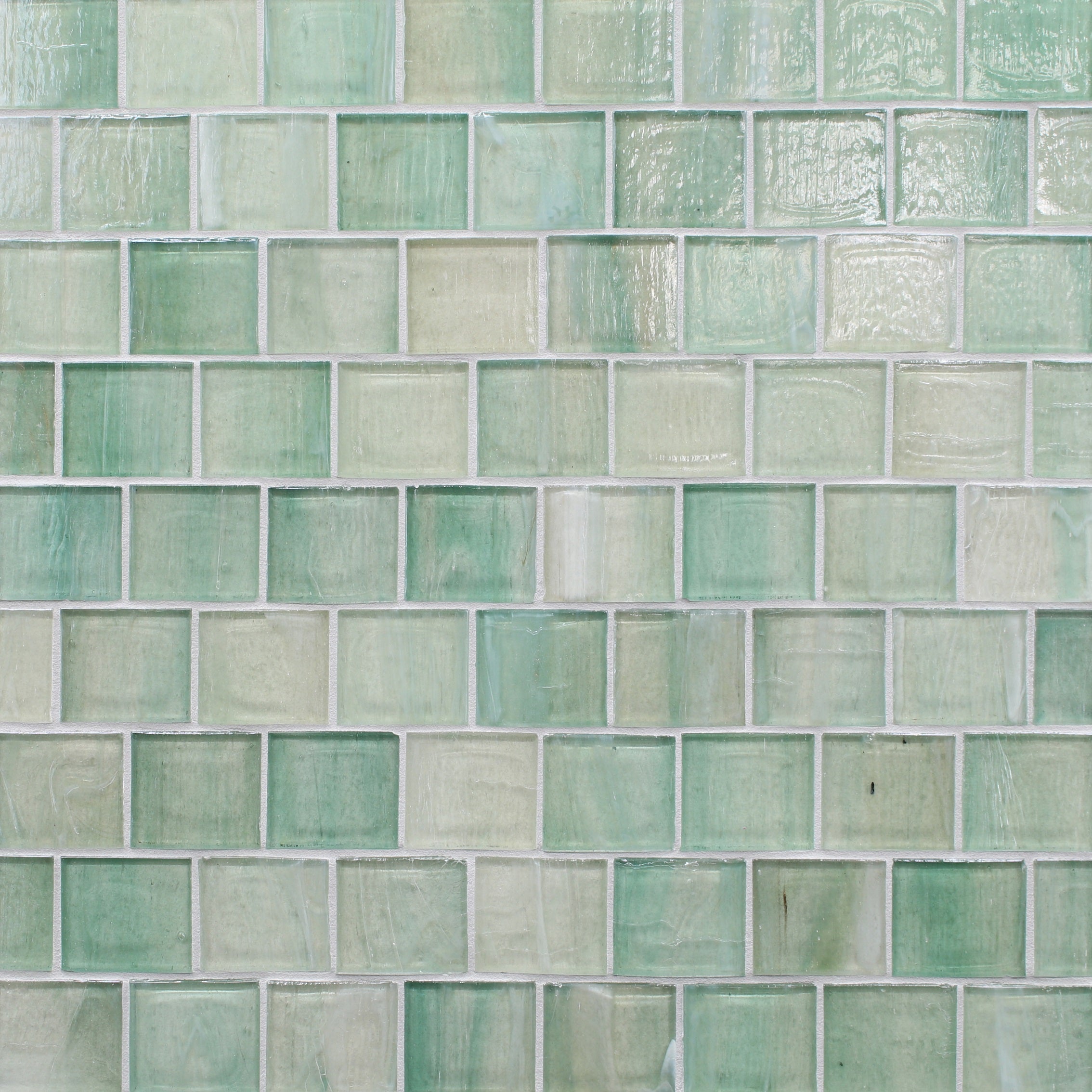 Artisan ceramic tiles from the Shoreline collection, showcasing soft ocean-inspired hues and textures.