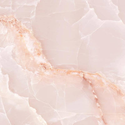 A close-up image showing a polished porcelain tile with a delicate pink marbling design, including soft tones and veins of a light brown or beige color that resemble onyx marble. The overall impression is one of subtle elegance and warmth.