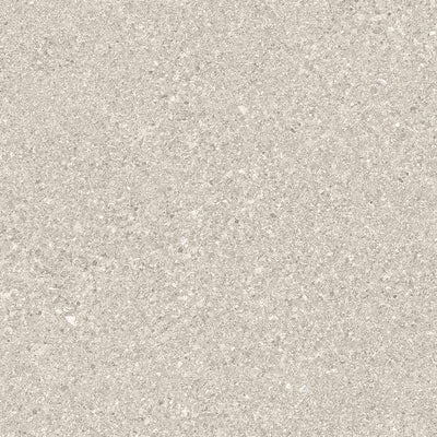 A close-up image of a porcelain tile with a fine, sandy texture and speckled pattern consisting of various shades of light and dark gray tones.