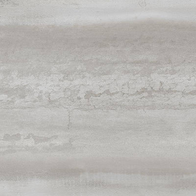 A close-up of a porcelain tile with a textured surface resembling weathered paint or a patina effect, in a palette of muted grays with subtle hints of beige and cream. |