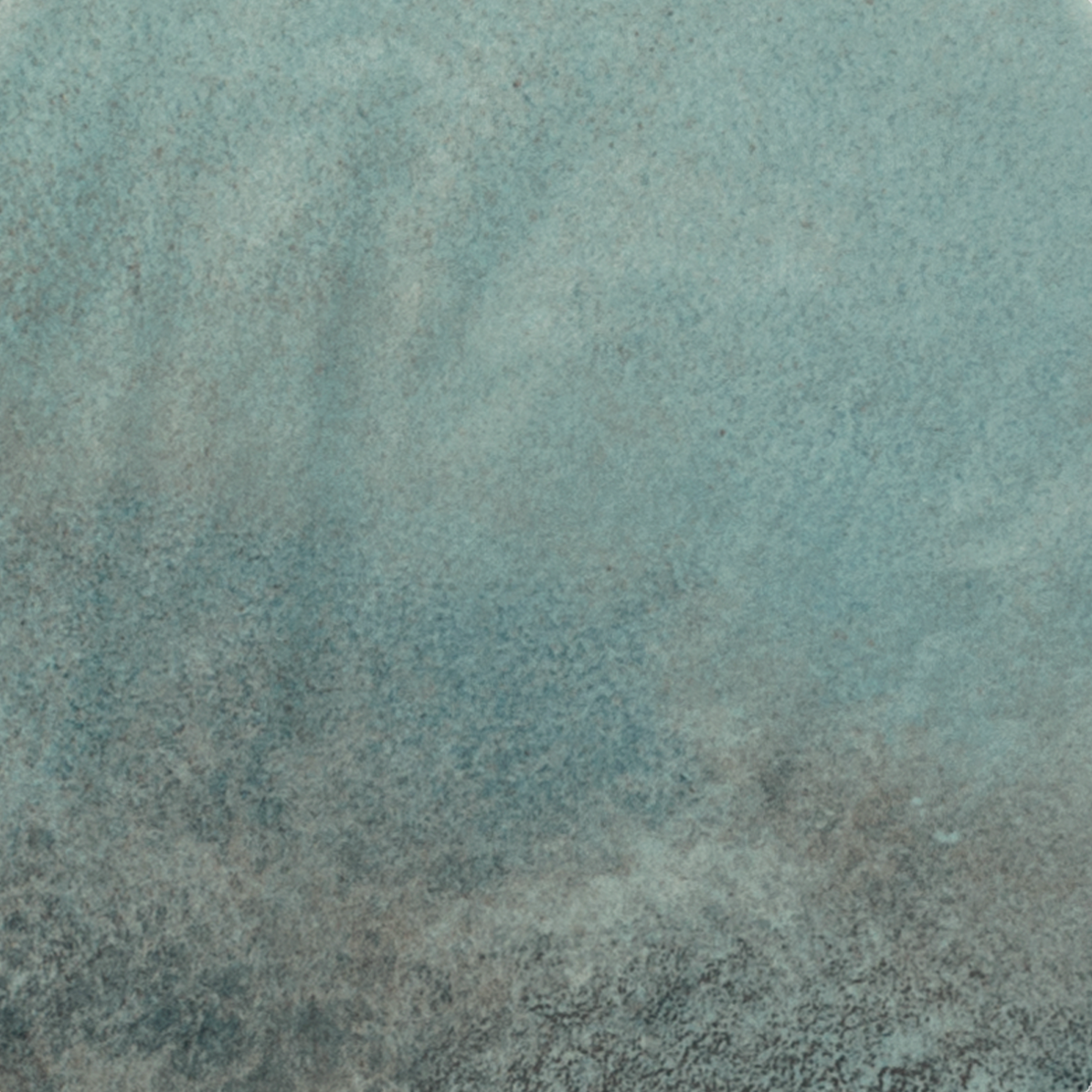 Green Moon ceramic tile from the Elon collection with a natural stone look available at Surface Group online tile store