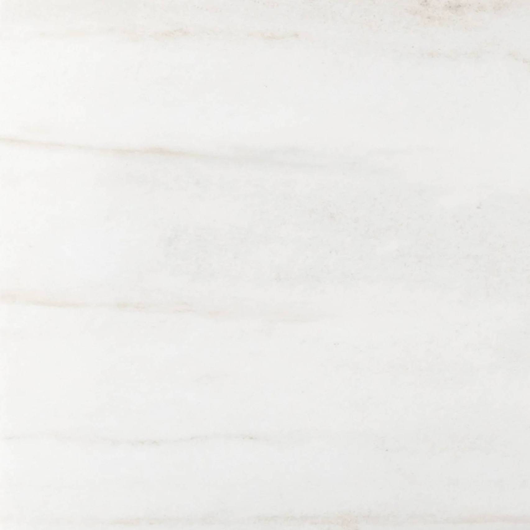 Elon Nuance Porcelain tile collection showcasing white Lasa Nuance marble-look in various sizes including mosaic and tile accessories