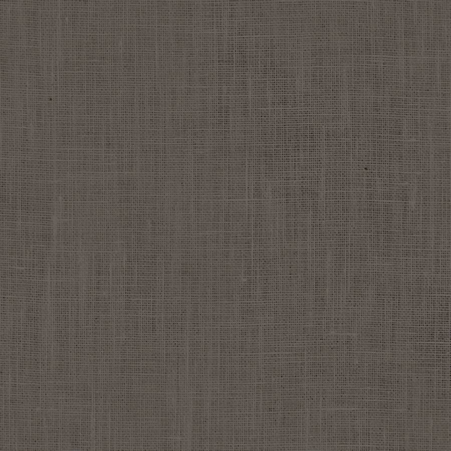 Close-up of a brown porcelain tile with a textured cloth-like finish from Surface Group.
