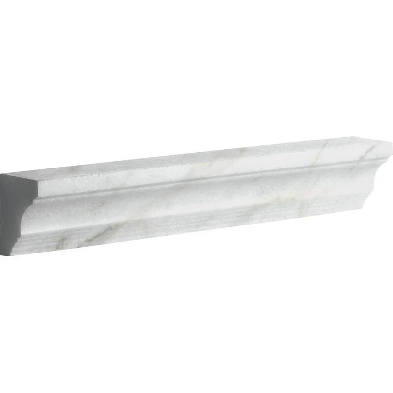 Elegant cornice moldings enhancing wall-ceiling transitions in interior design.