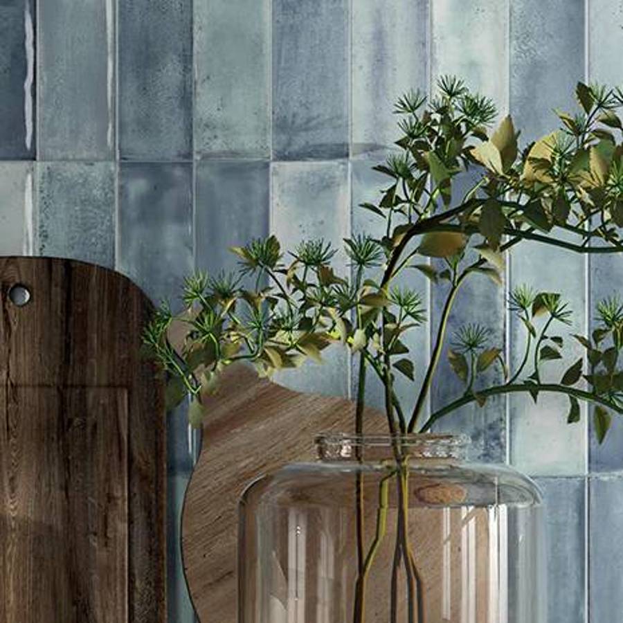 Elon Timeless Porcelain tile collection in shades of blue, green, gray, and white, showcasing various patterns and finishes for elegant flooring and wall designs, available at Surface Group online tile store.