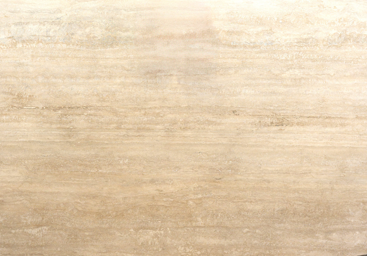Travertine Slabs Travertino Navona travertine slabs, top-down product view. Premium travertine for floors and walls.