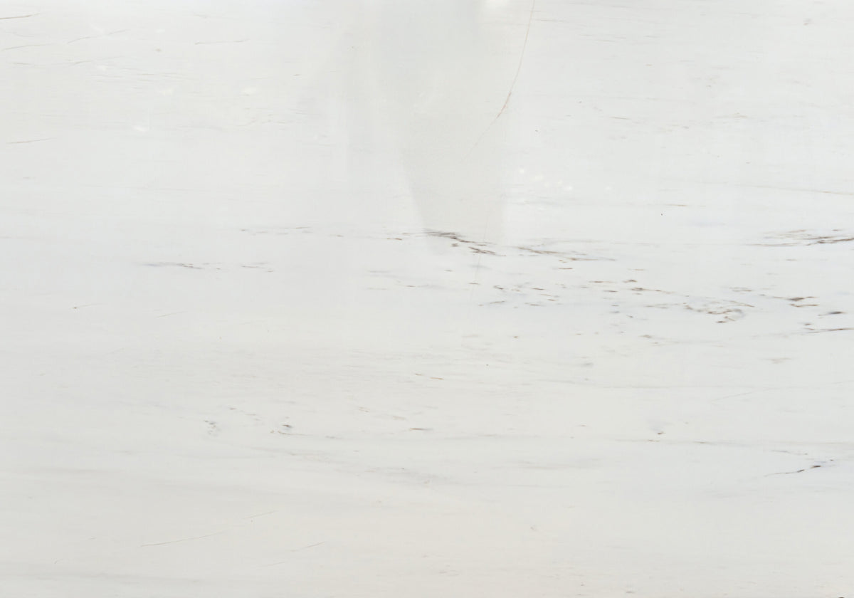 Marble Slabs Snow White Supreme marble slabs, top-down product view. Premium marble for floors and walls.