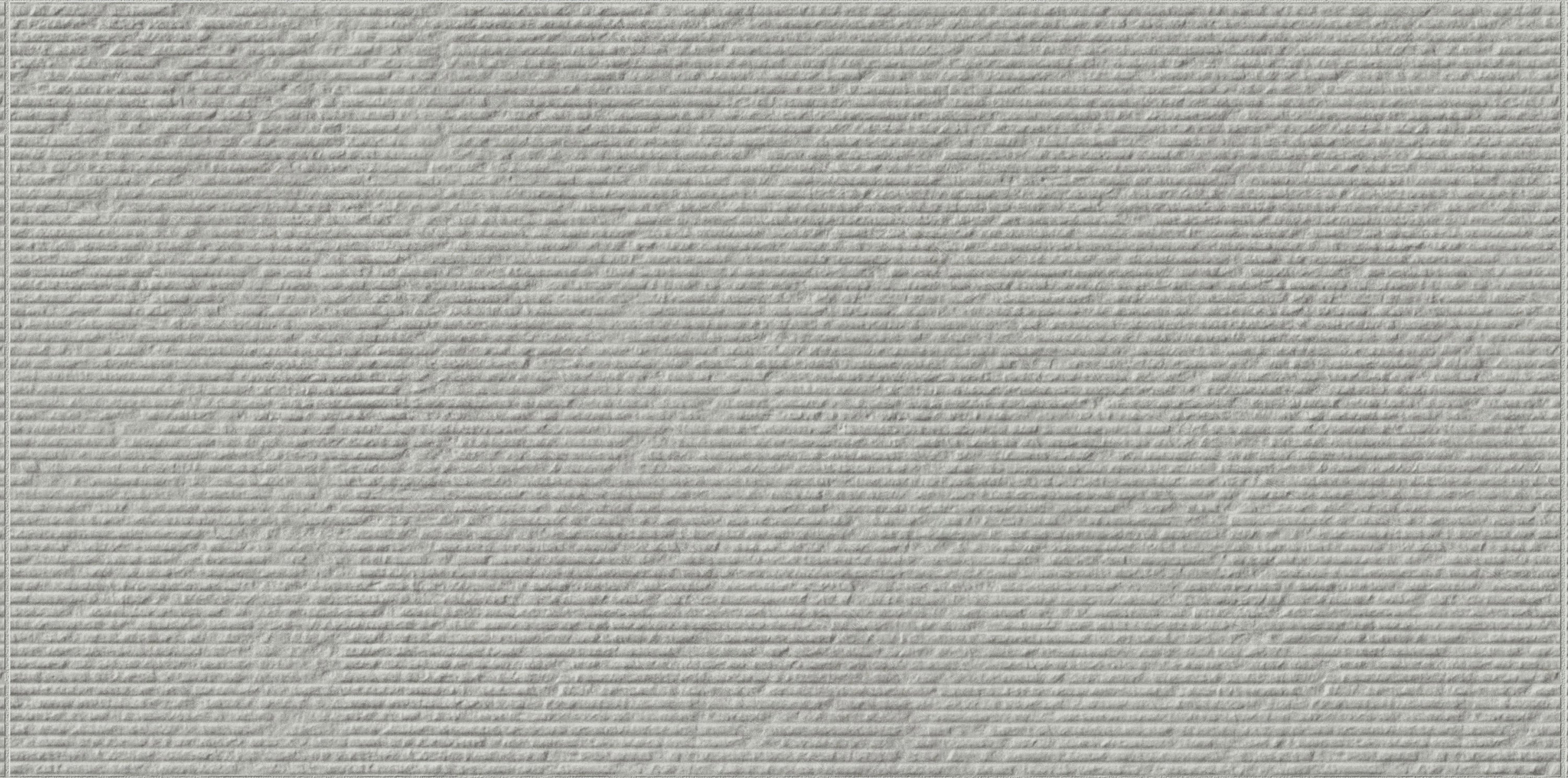 Veneer World Atelier Essence Montauk Grey porcelain field tile, top-down product view, 12"×24"×11/32" size. Premium porcelain for floors and walls.
