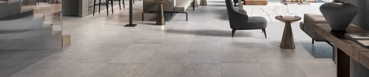 Bluestone Thermal Blue Select porcelain trim, lifestyle installation view 1, 3"×24"×11/32" size. Premium porcelain for floors and walls.