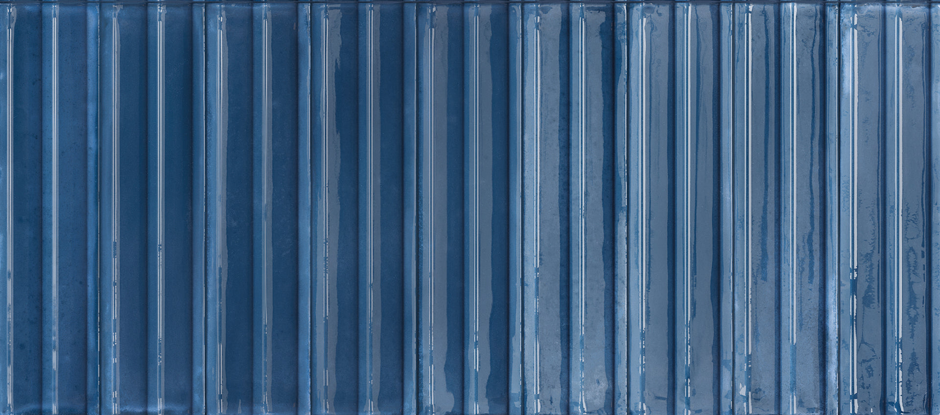 Essential Brick BLU porcelain field tile by Emil, lux finish, 2"x10" size. Premium Italian porcelain for floors and walls.