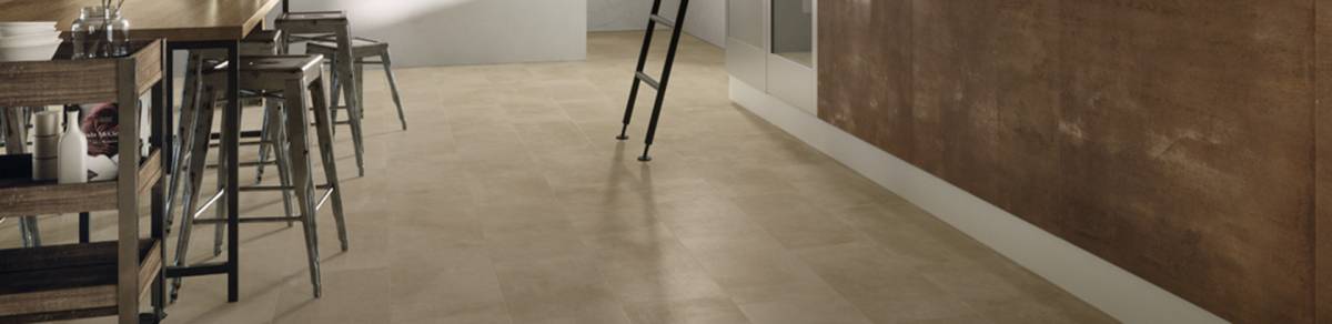 ATTITUDE Calm Brown porcelain trim, lifestyle installation view 1, 3"×24"×11/32" size. Premium porcelain for floors and walls.
