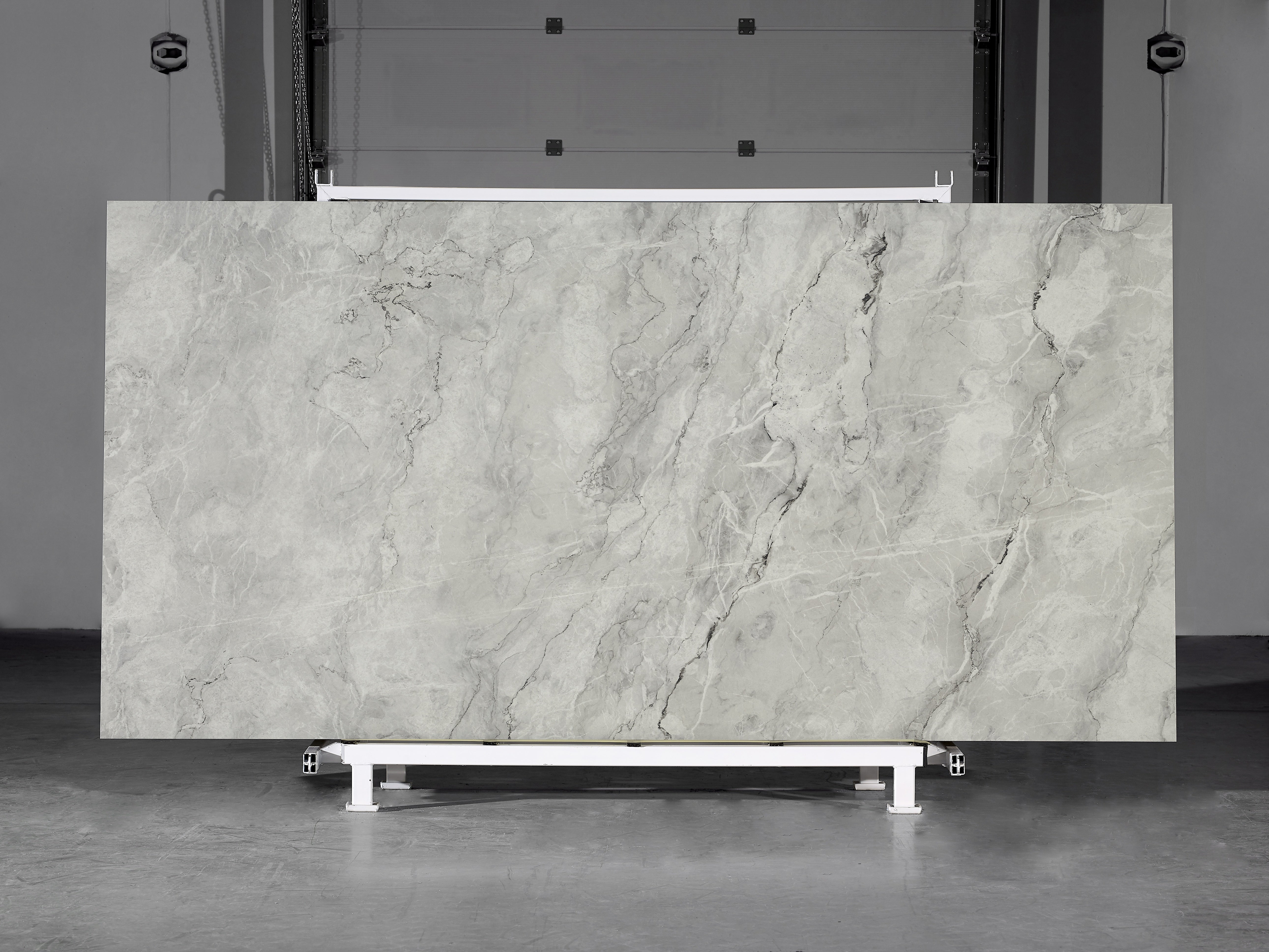 Majesto Atlantic Ocean sintered stone slabs by Anatolia, top-down product view, 64"×127"×15/32" size. Turkish sintered stone for floors and walls.