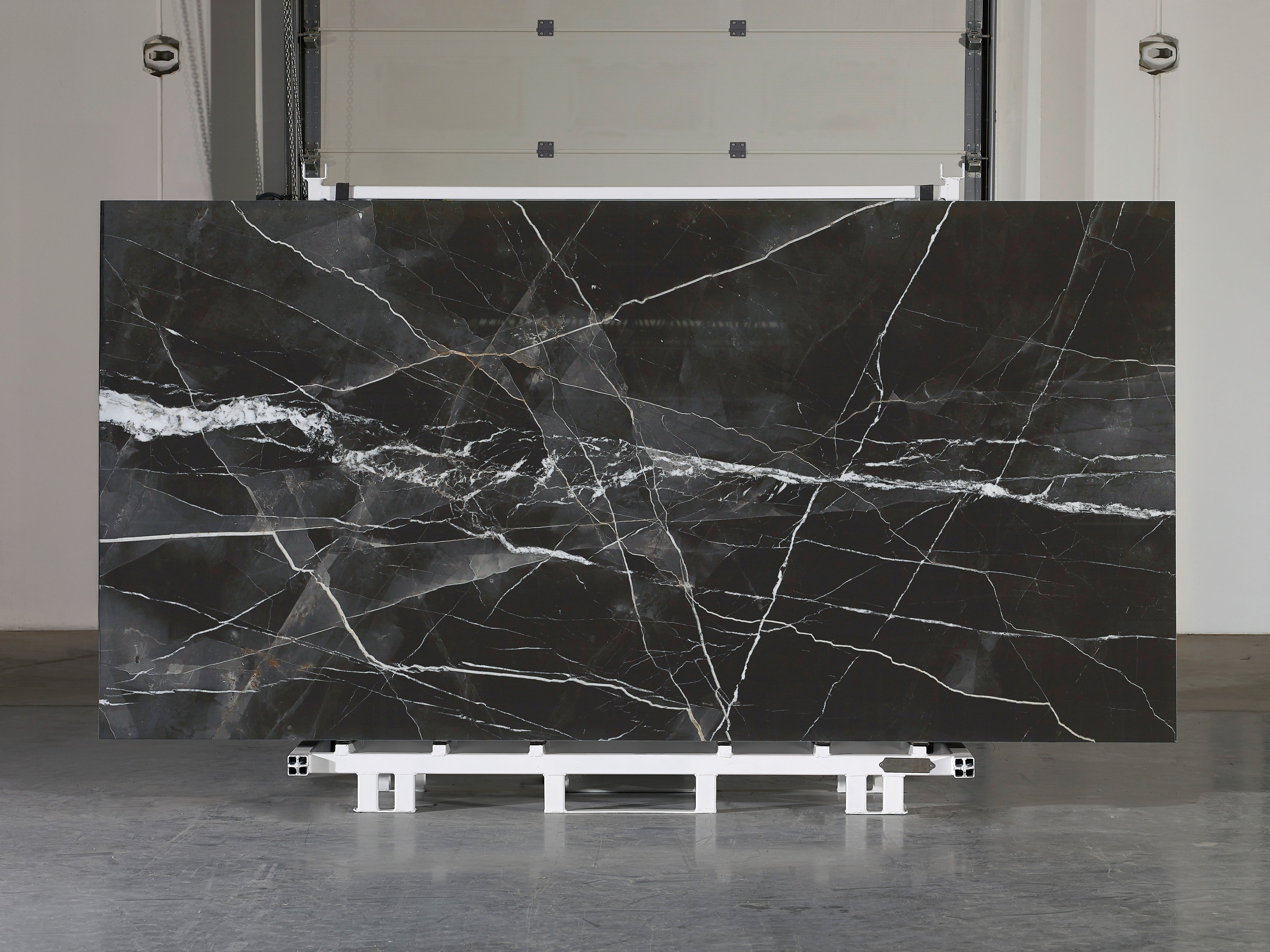 Majesto Calacatta Noir sintered stone slabs by Anatolia, top-down product view, 64"×127"×15/32" size. Turkish sintered stone for floors and walls.