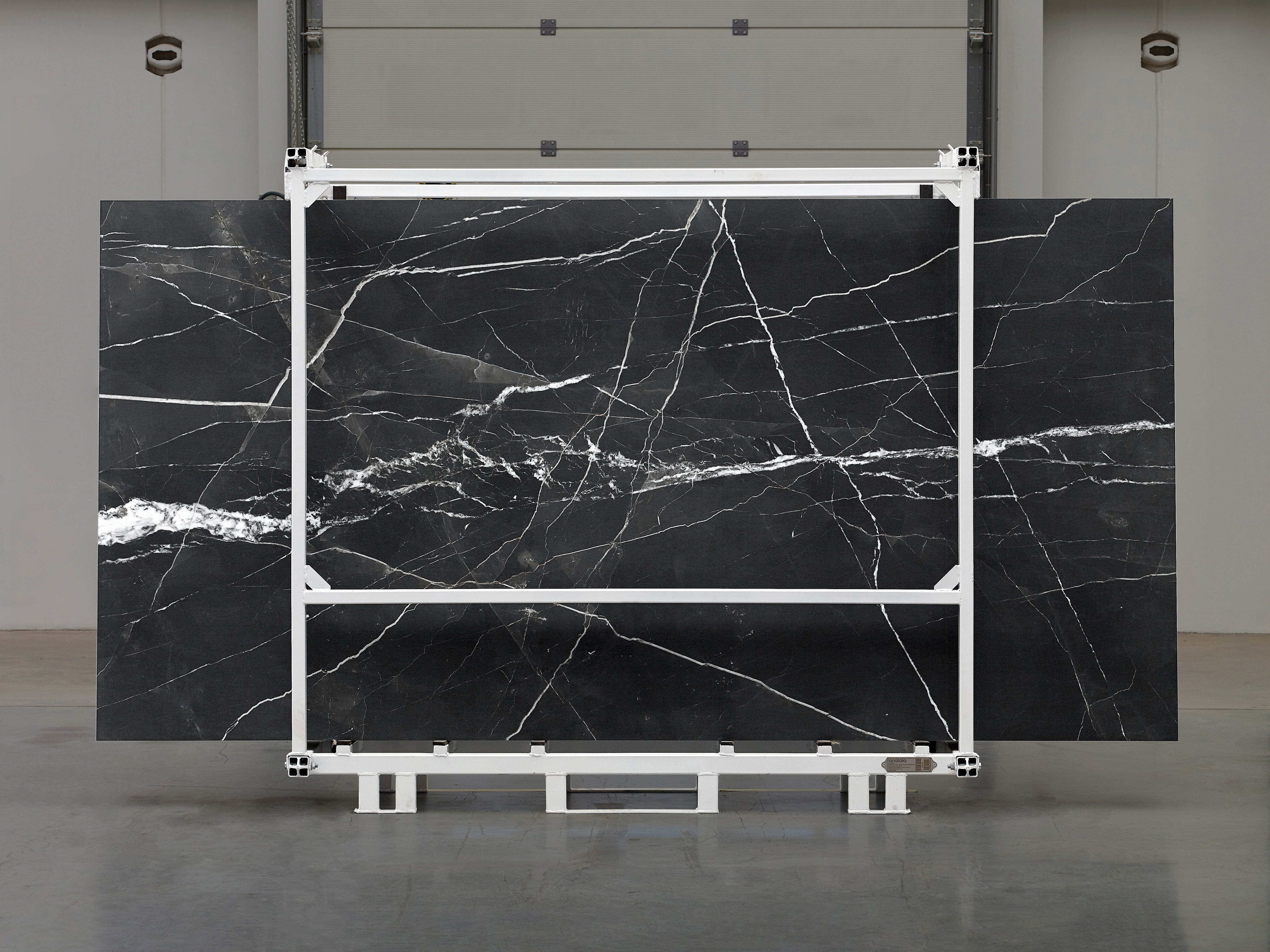 Majesto Calacatta Noir sintered stone slabs by Anatolia, top-down product view, 64"×127"×15/32" size. Turkish sintered stone for floors and walls.