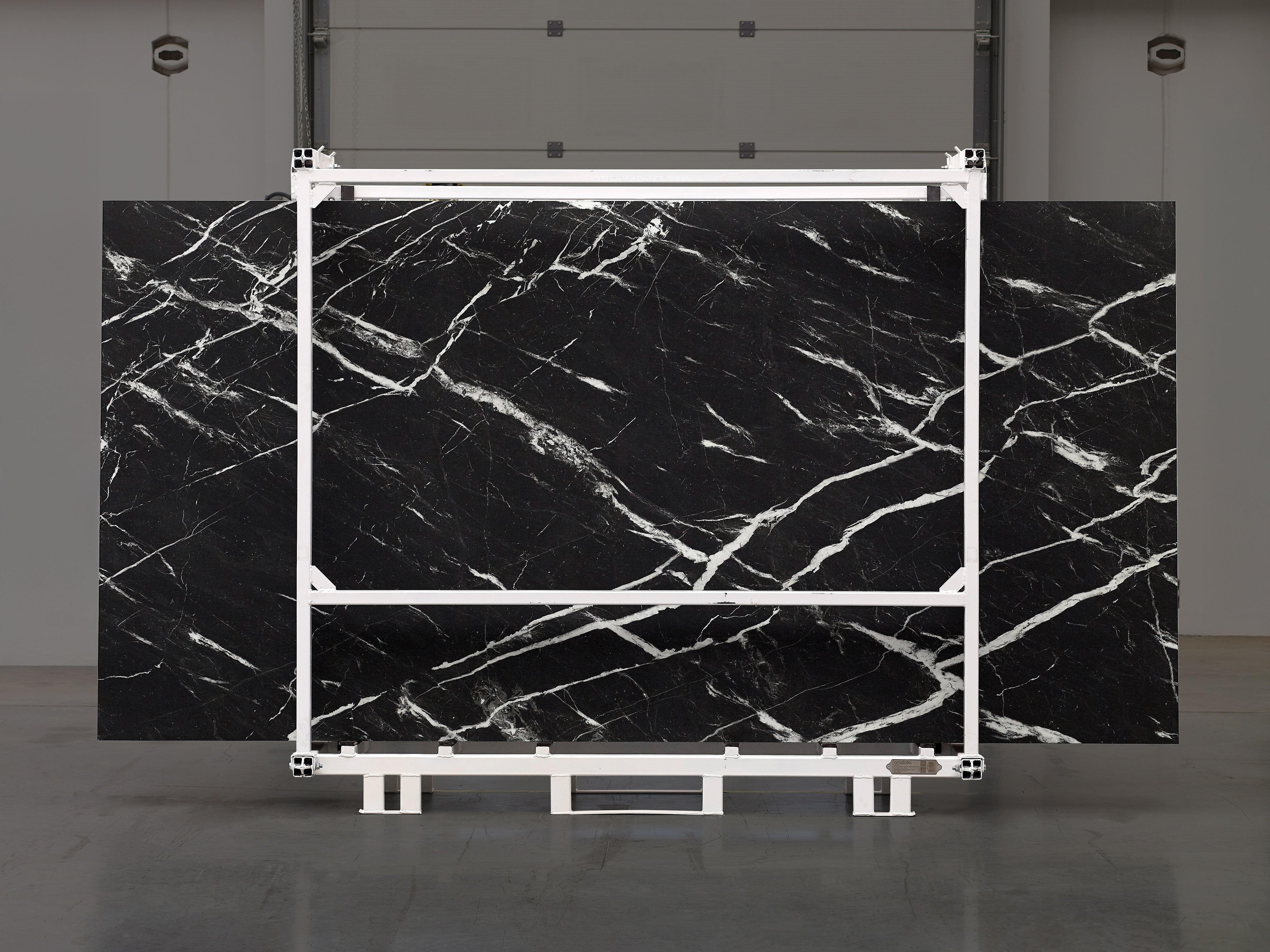Majesto Nero Marquina sintered stone slabs by Anatolia, top-down product view, 64"×127"×15/32" size. Turkish sintered stone for floors and walls.