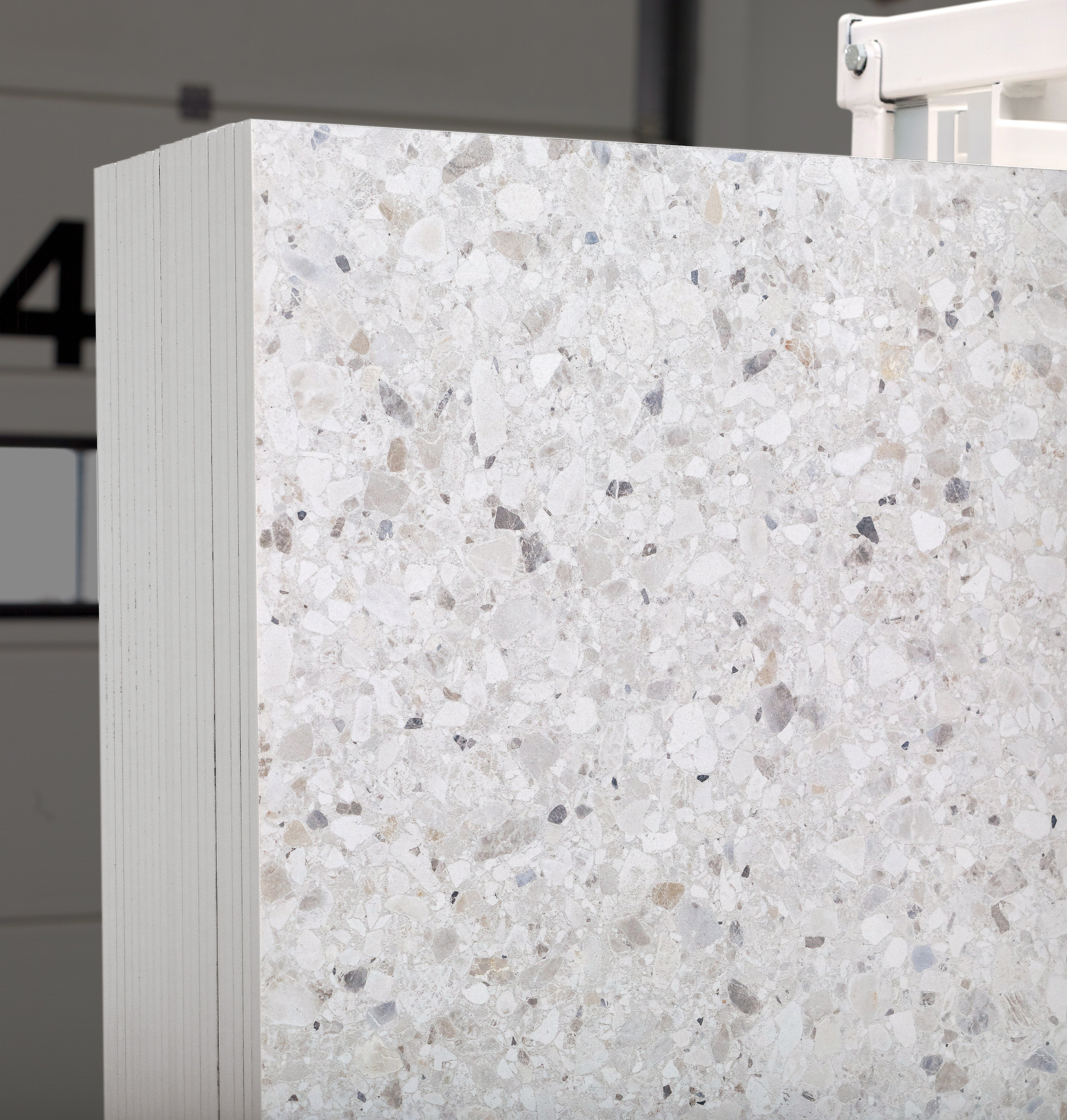 Majesto Terrazzo Delicato sintered stone slabs by Anatolia, top-down product view, 64"×127"×15/32" size. Turkish sintered stone for floors and walls.