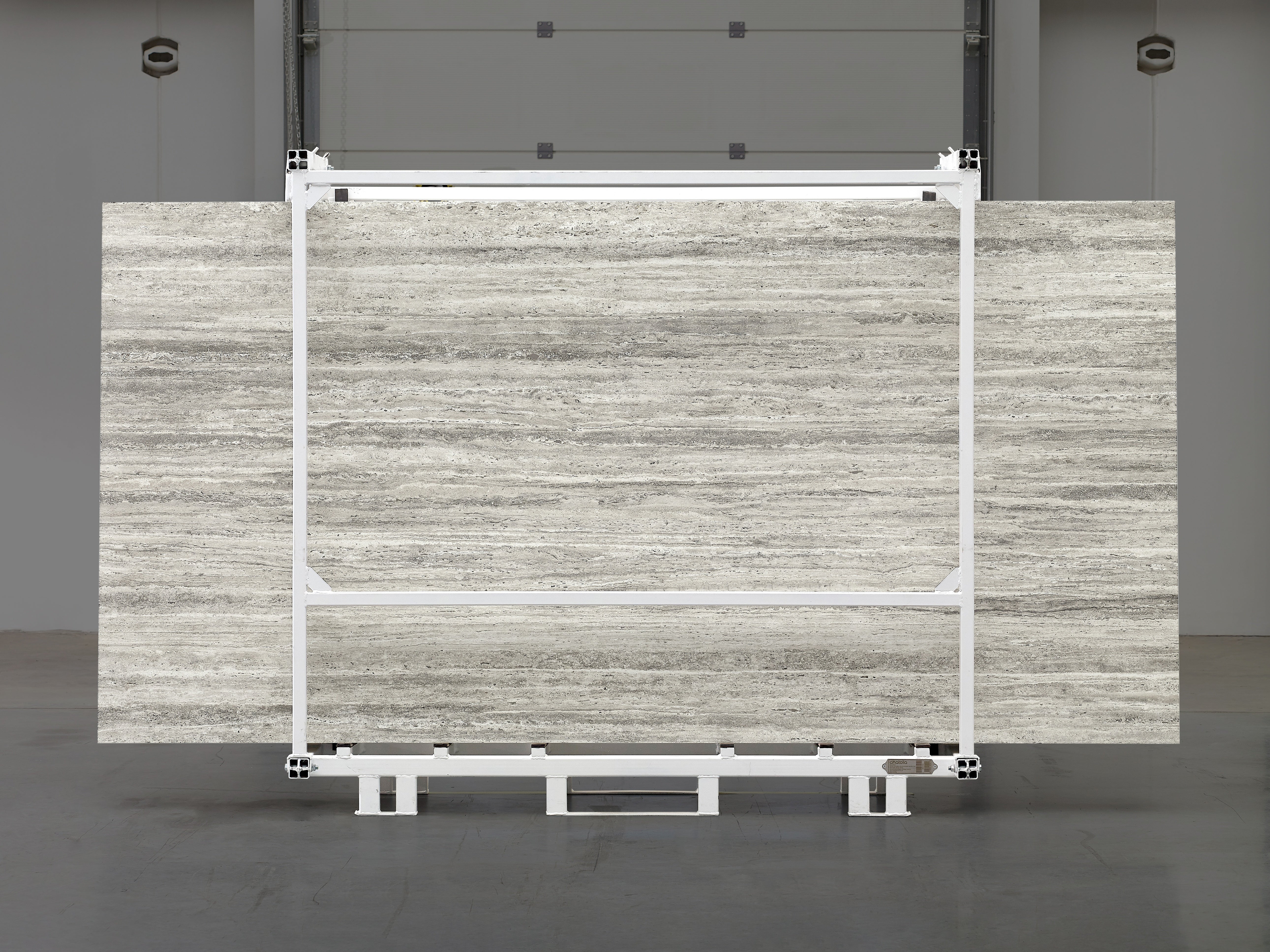 Majesto Travertino Titanium sintered stone slabs by Anatolia, top-down product view, 64"×127"×15/32" size. Turkish sintered stone for floors and walls.
