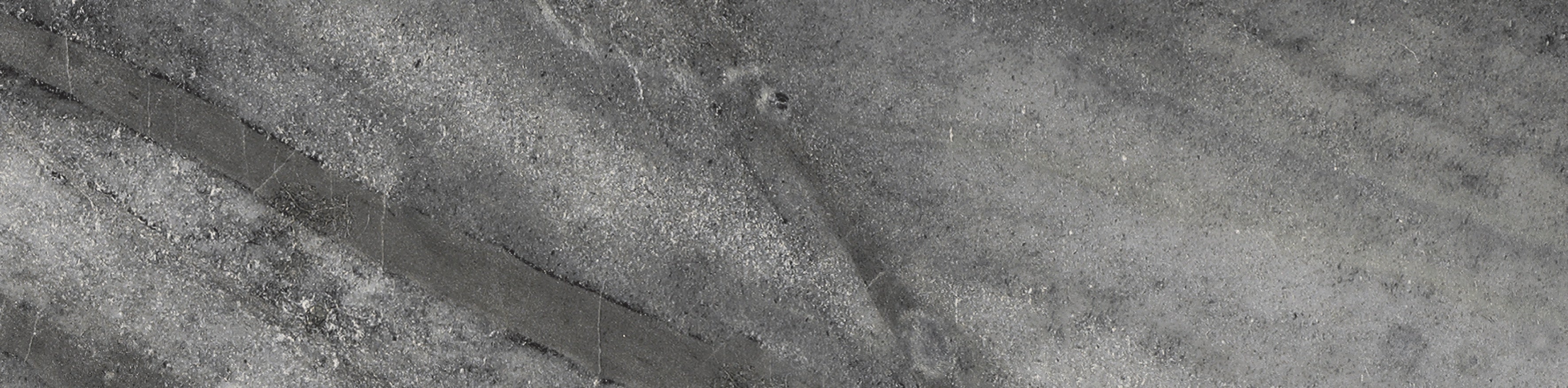 Evolution Carbon porcelain trim by Anatolia, top-down product view, 3"×12"×11/32" size. Turkish porcelain for floors and walls.