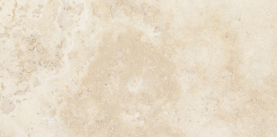 Ivory travertine field tile by Anatolia, top-down product view, 3"×6"×3/8" size. Turkish travertine for floors and walls.