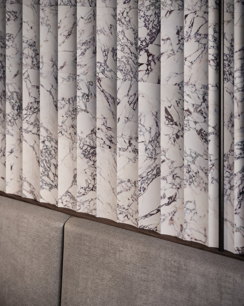 Anatolia Viola Roccia honed marble tile in a room setting — available at Surface Group lifestyle image