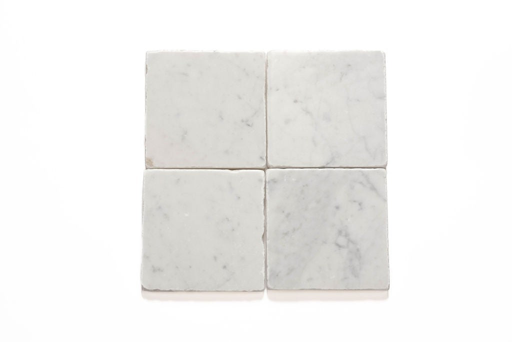 Bianco Carrara marble field tile, primary product image, 12"×24"×3/8" size. Premium marble for floors and walls.